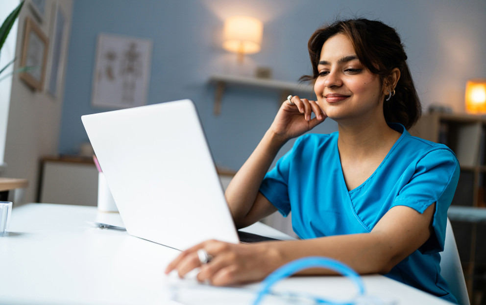 Caregiver using her laptop