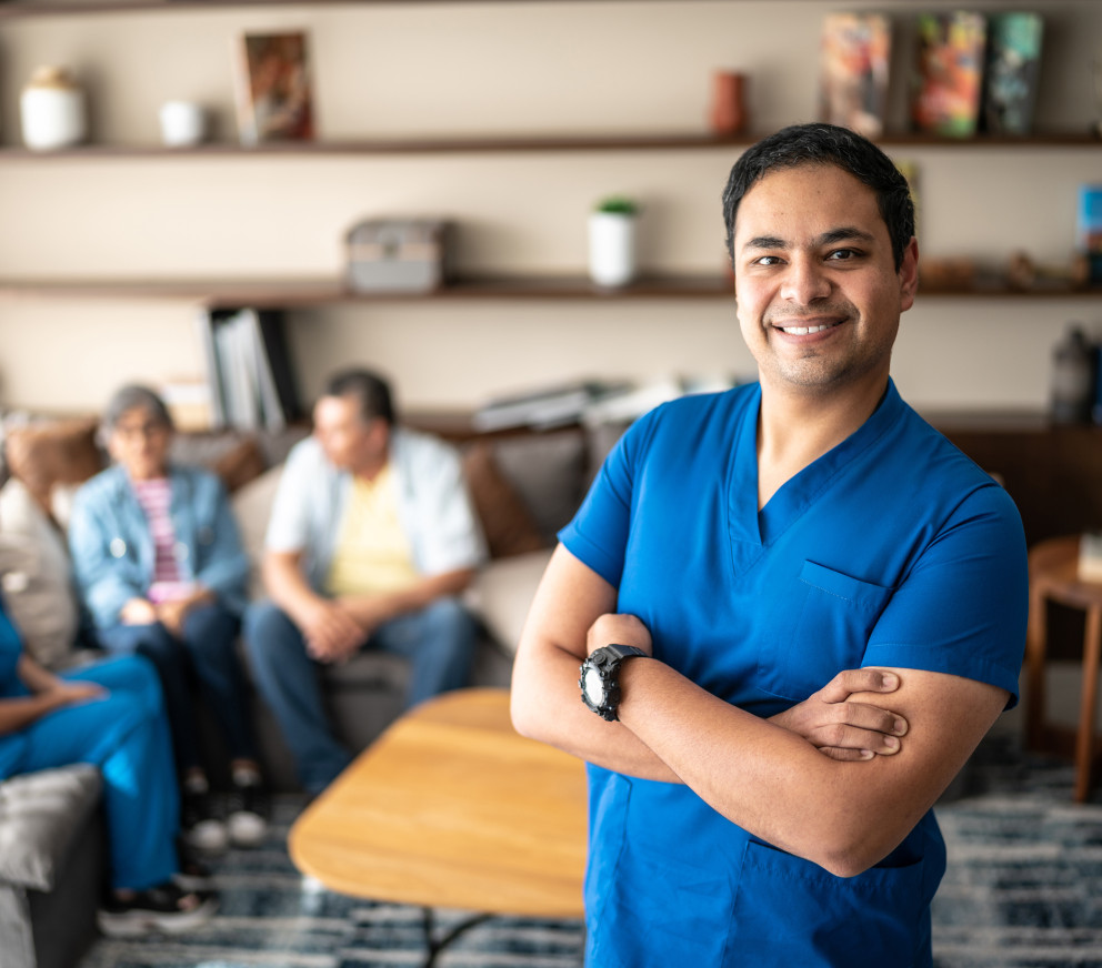 Caregiver standing in from of a personalized meeting
