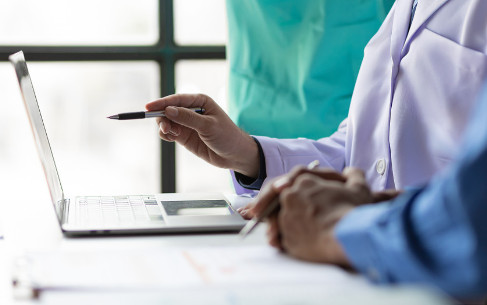 Caregiver using a laptop