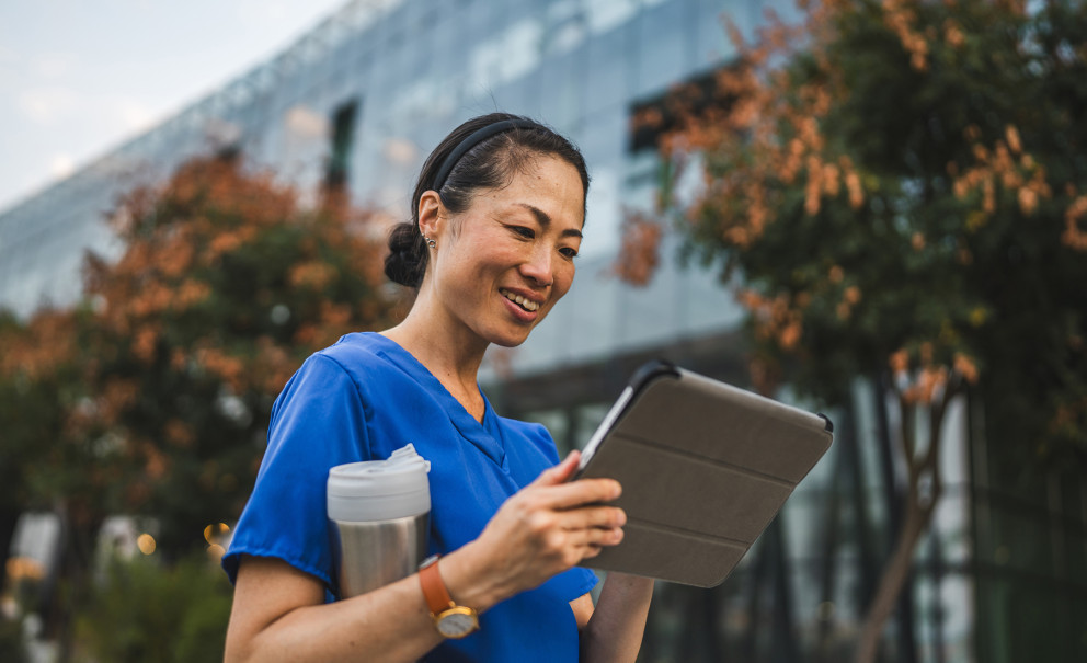 Woman using nevvon APP on her tablet device